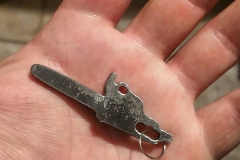 raw steel chainsaw keychain